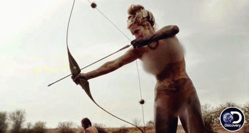 Melissa Miller shooting her bow on Naked and Afraid